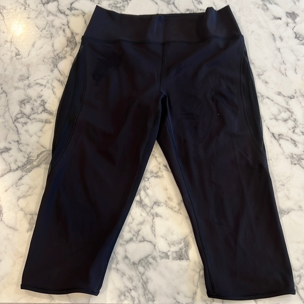 Lululemon leggings Black with mesh detail on the outer legs